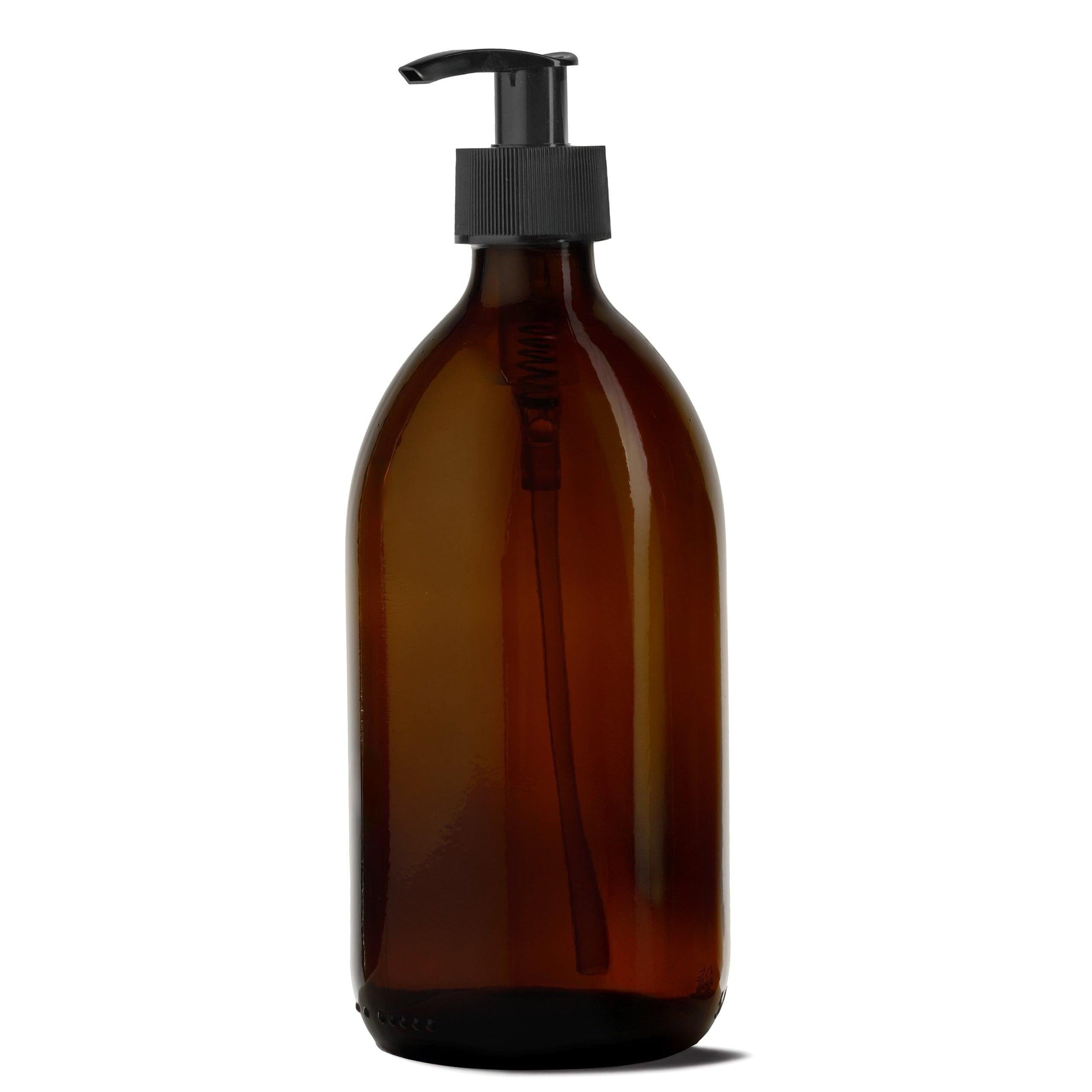 Genopfyldelig 300ml sæbedispenser i brunt glas med sort pumpe, håndlavet på Djursland med en enkel og holdbar finish.